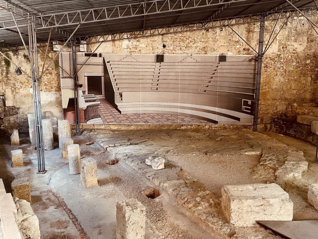 Alfama in Lisbon: A Tourist Guide 19 Alfama in Lisbon features an ancient open-air theater with stone ruins and a modern stage, blending historic charm with cultural entertainment in the heart of the city.