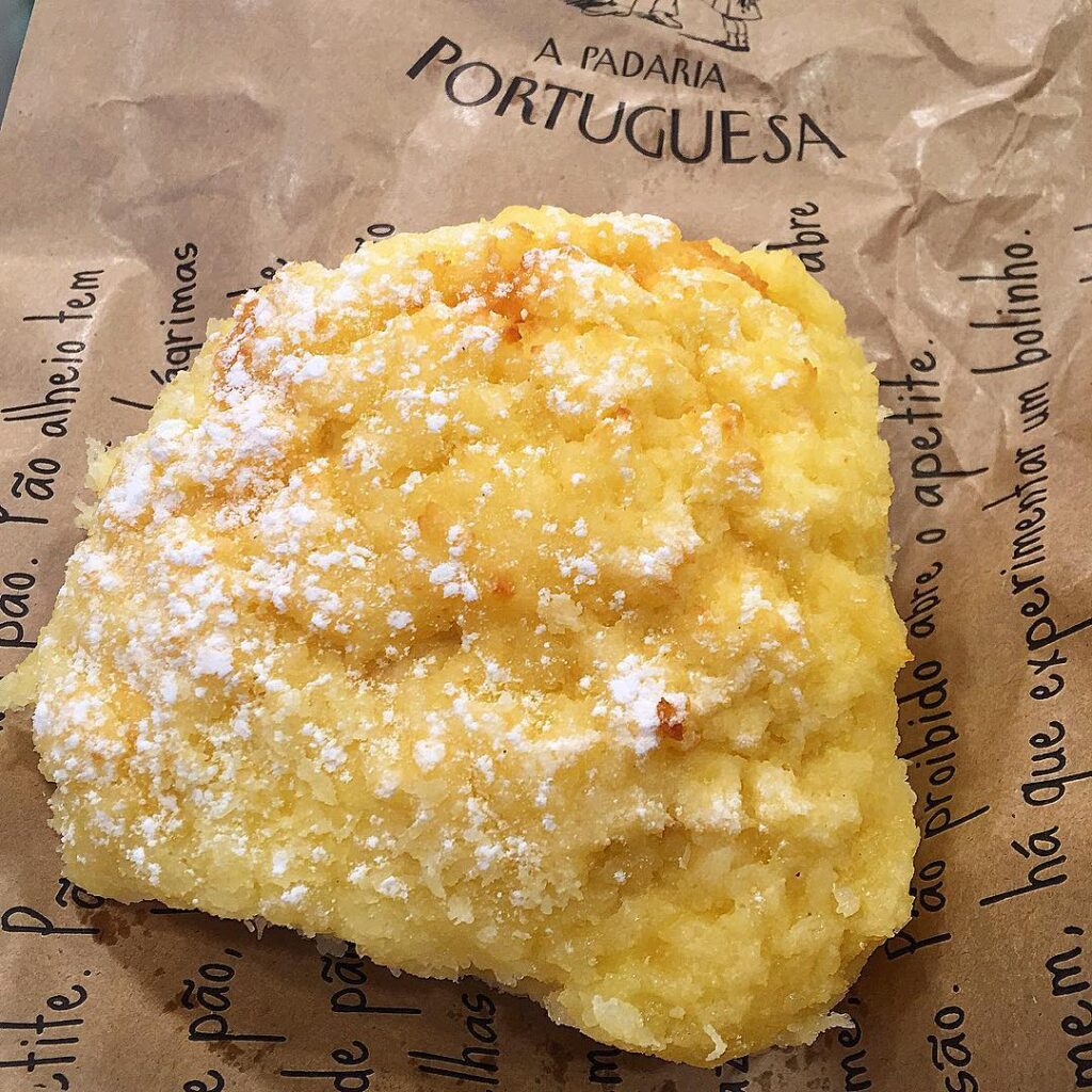 6 Best Portuguese Restaurants in Lisbon (Local & Authentic) 12 Butter pastry, Portuguese pastries, authentic Portuguese dessert, Lisbon bakery, traditional Portuguese snack, LisbonVibes, LisboaVibes, Portuguese cuisine, delicious pastry, local Lisbon treat.