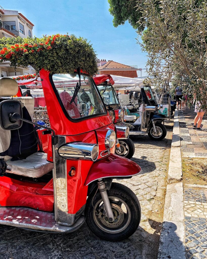 Lisbon Tuk Tuk: Is This The Best Way to Experience Lisbon? 2 red tuk tuk in lisbon